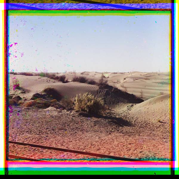 railroad_tracks_through_desert_dunes.jpg